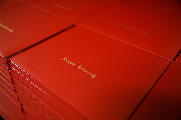 Red Indiana University diploma cover.